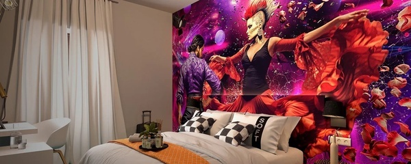 une chambre avec un lit et une peinture sur le mur