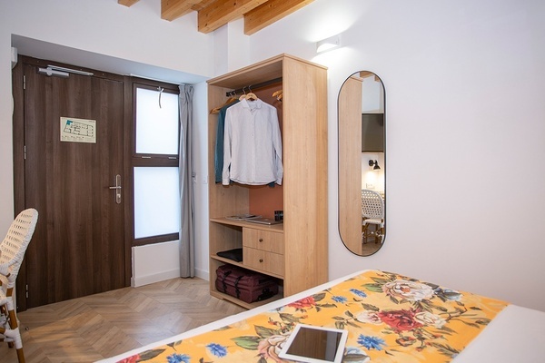 a room with a sign on the door that says ' emergency exit '