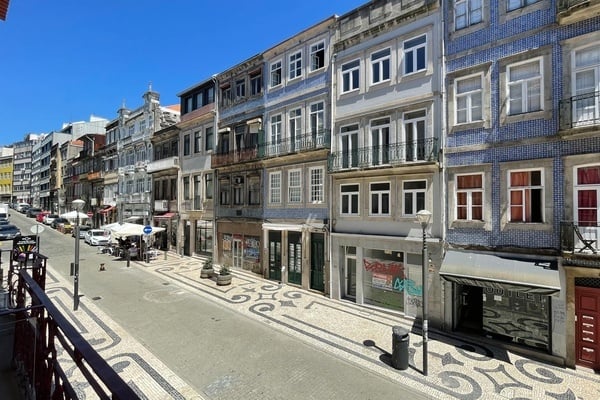 a row of buildings with one that has a sign that says ' a ' on it