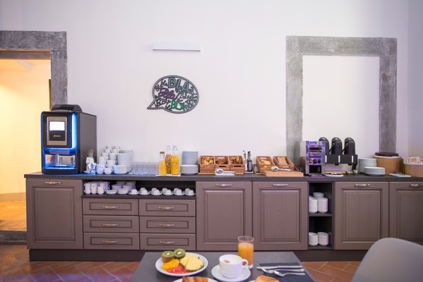 a buffet with a speech bubble on the wall