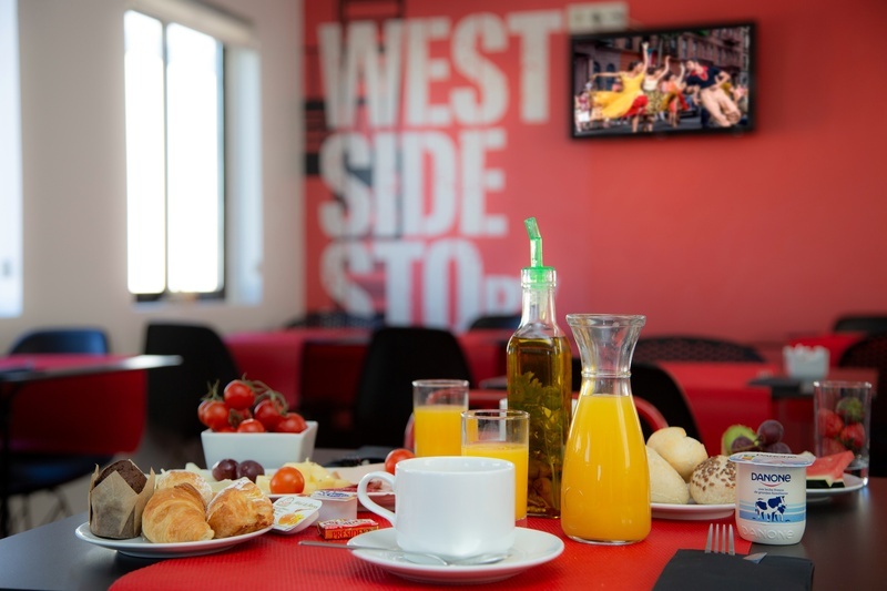 the word west is on the wall behind the table
