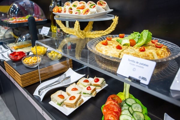 a display of food with a sign that says 