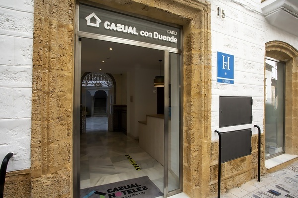 the entrance to a casual con duende hotel