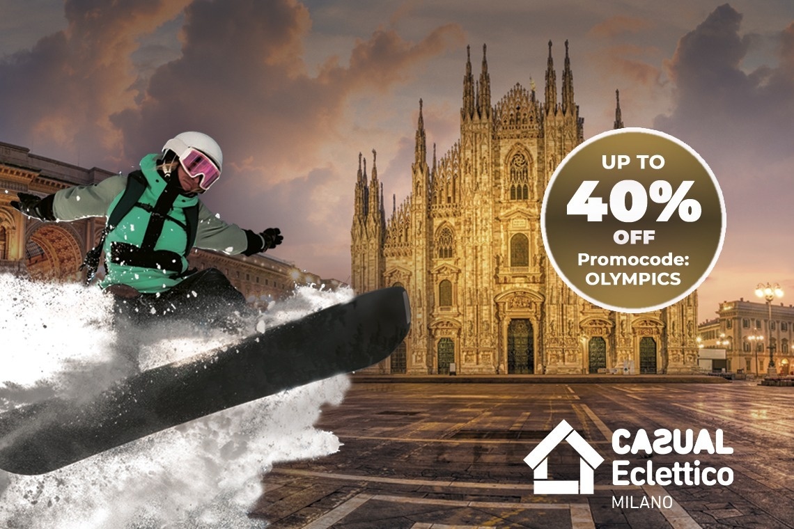 a man is carrying a woman on his back on the beach