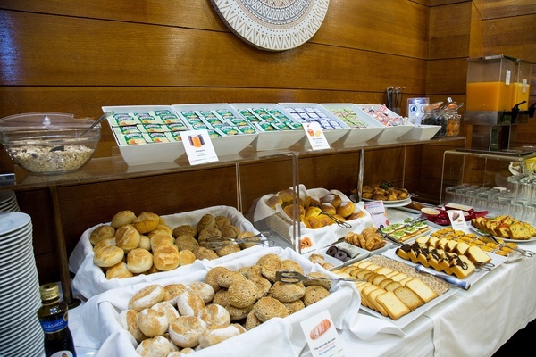 a buffet with a sign that says ' bread ' on it