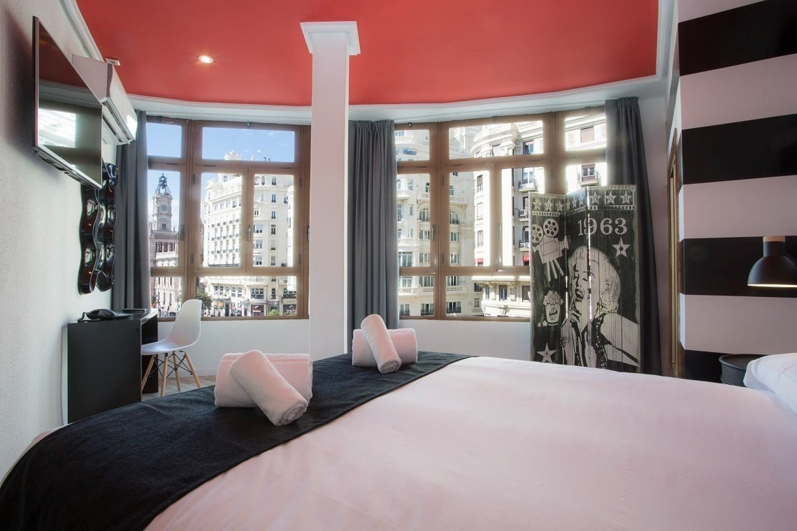 a room with a bed and a sign that says 1963
