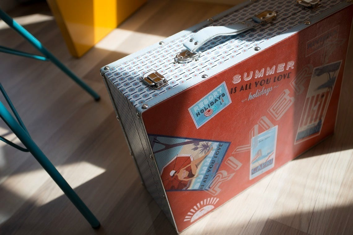 a suitcase that says summer is all you love holidays