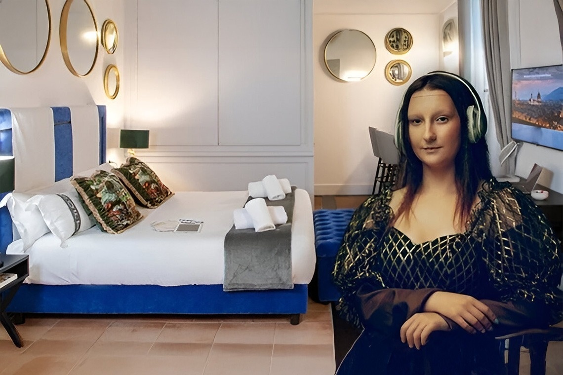 un hombre lleva a una mujer en sus hombros en la playa