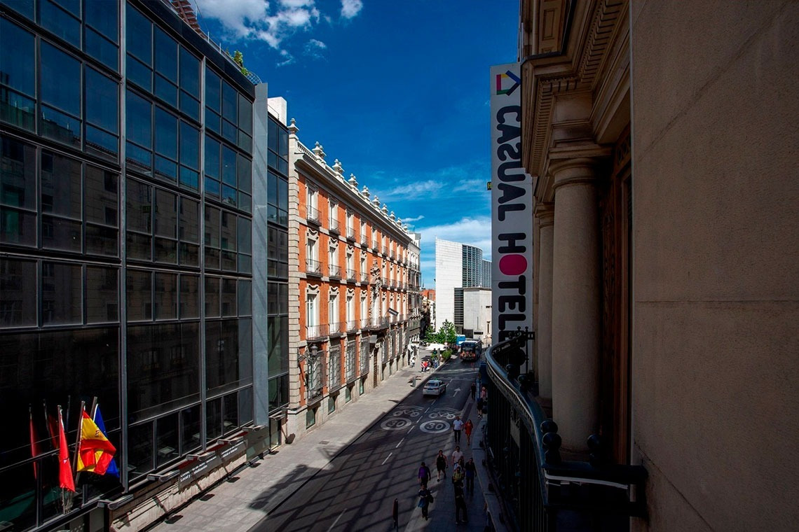 a building with a sign that says casual hotel on it