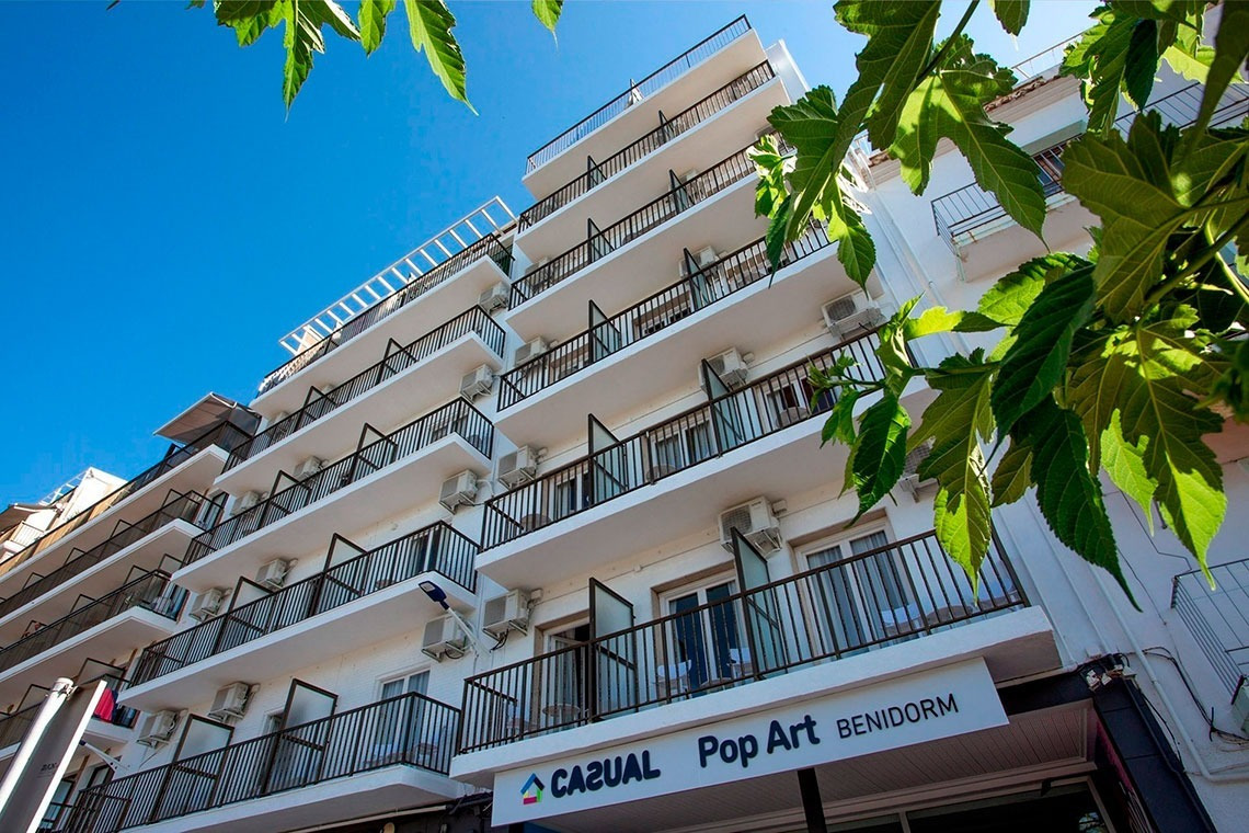 a building with a sign that says casual pop art benidorm