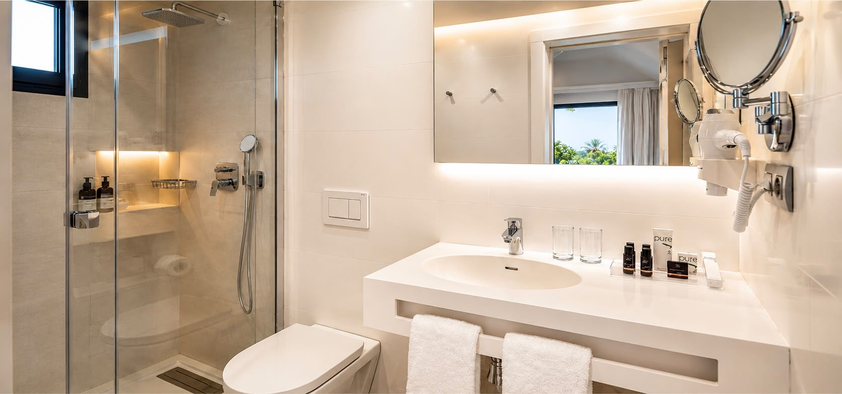 Modern bathroom at Club Maspalomas with shower and vanity