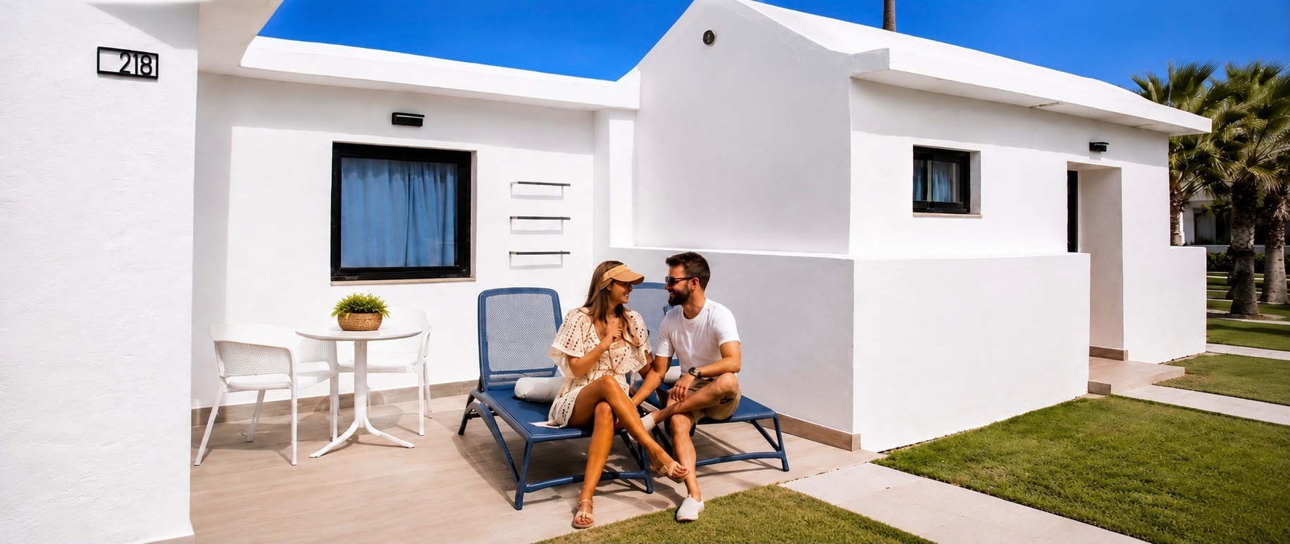 Modern hotel room at Club Maspalomas with terrace and balcony.