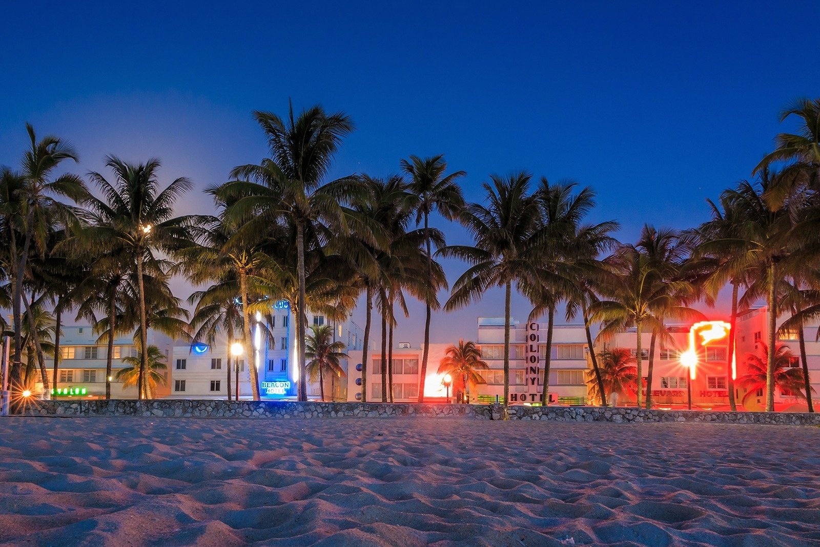 palmer house is lit up at night with green lights