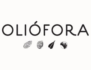 a bottle of conve espin wine is poured into a glass