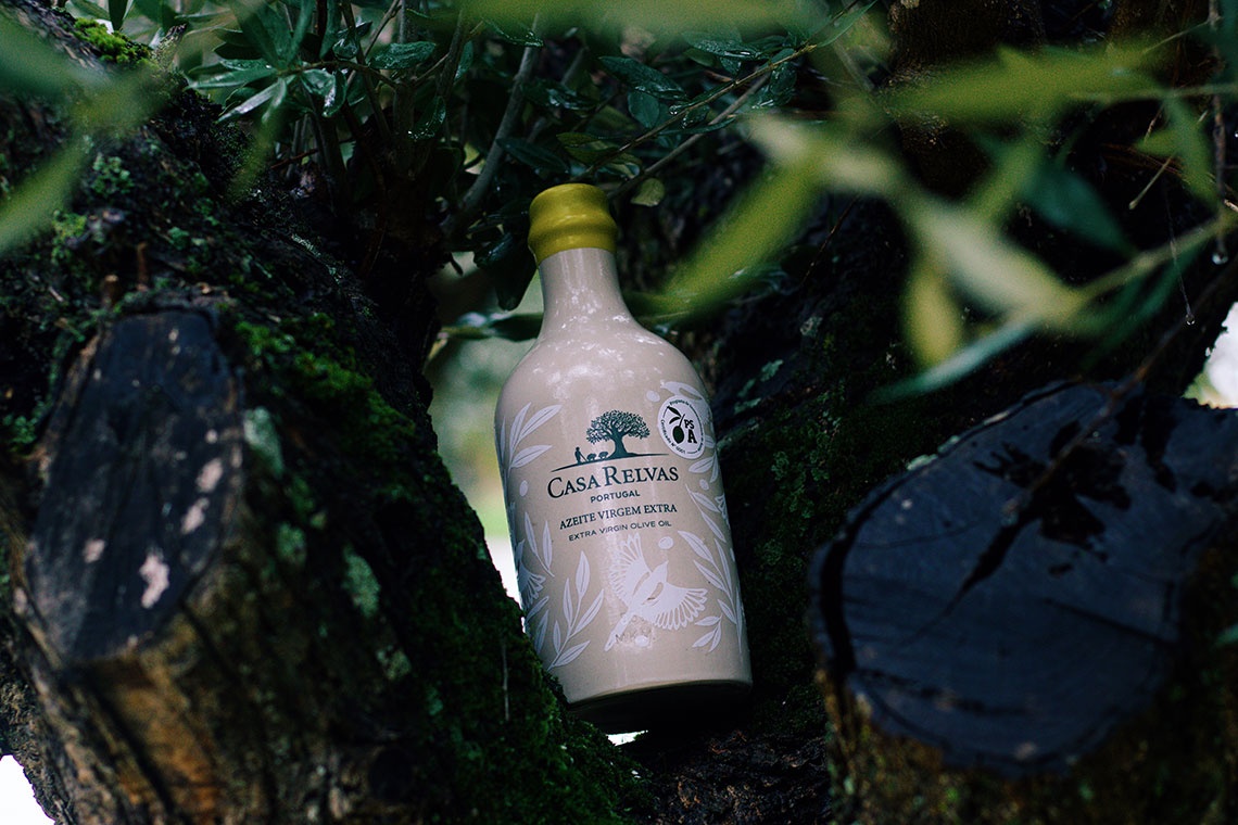 Casa Relvas olive oil bottle nestled in a tree at Convento do Espinheiro.