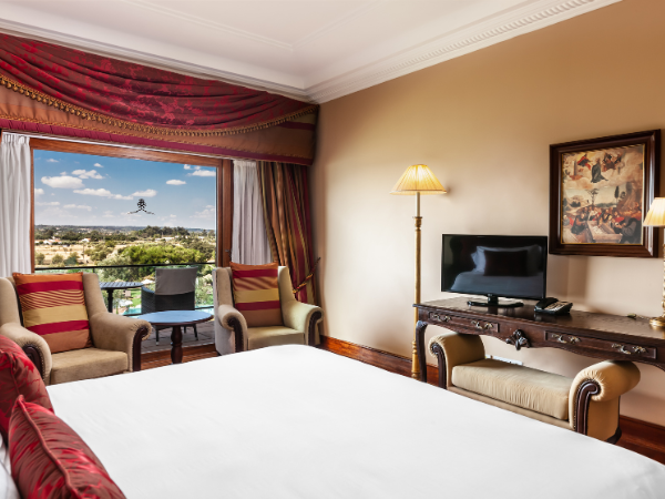 a person is kneading dough in a bowl