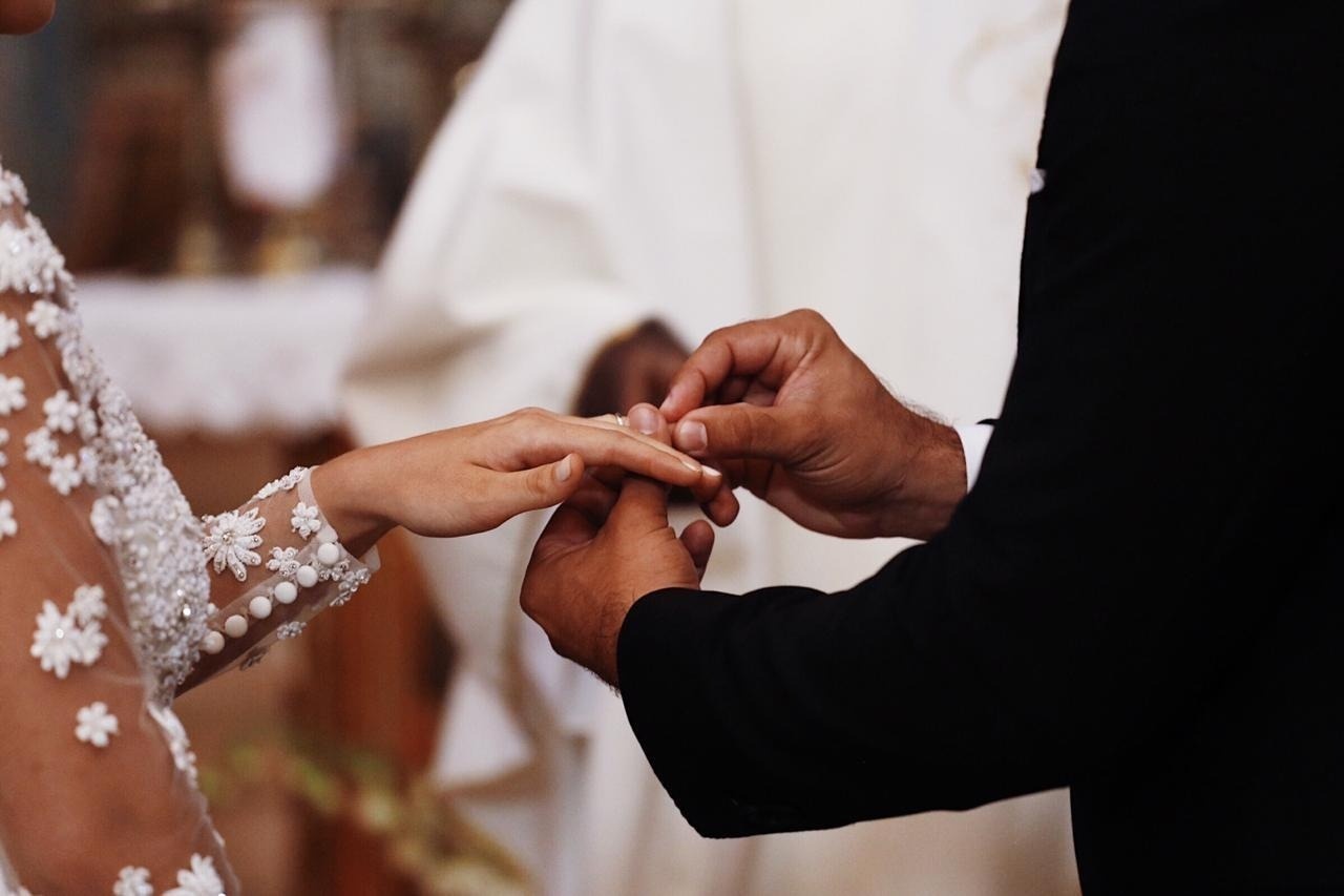 a woman getting her hair washed with a towel