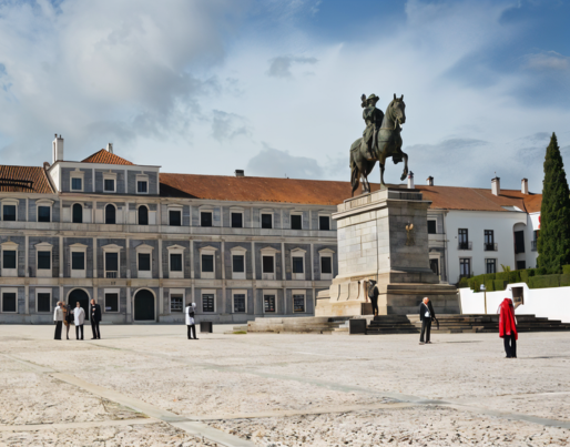 a large building with a statue of a man on a horse in front of it