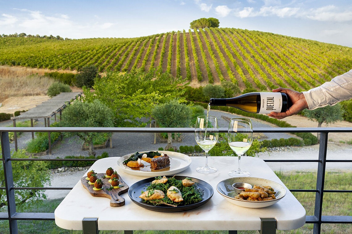 Dining with wine amidst vineyards at Convento do Espinheiro.