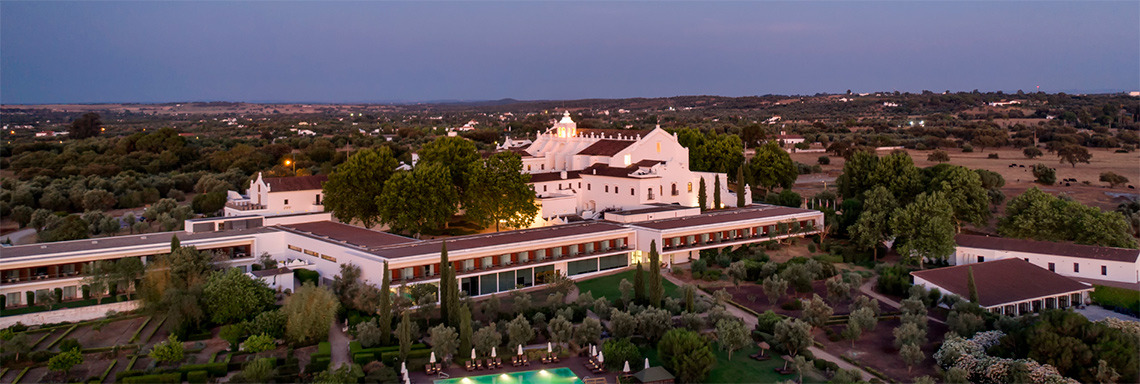 Historic hotel and spa at dusk. FAQ | Convento do Espinheiro, Historic Hotel & Spa.