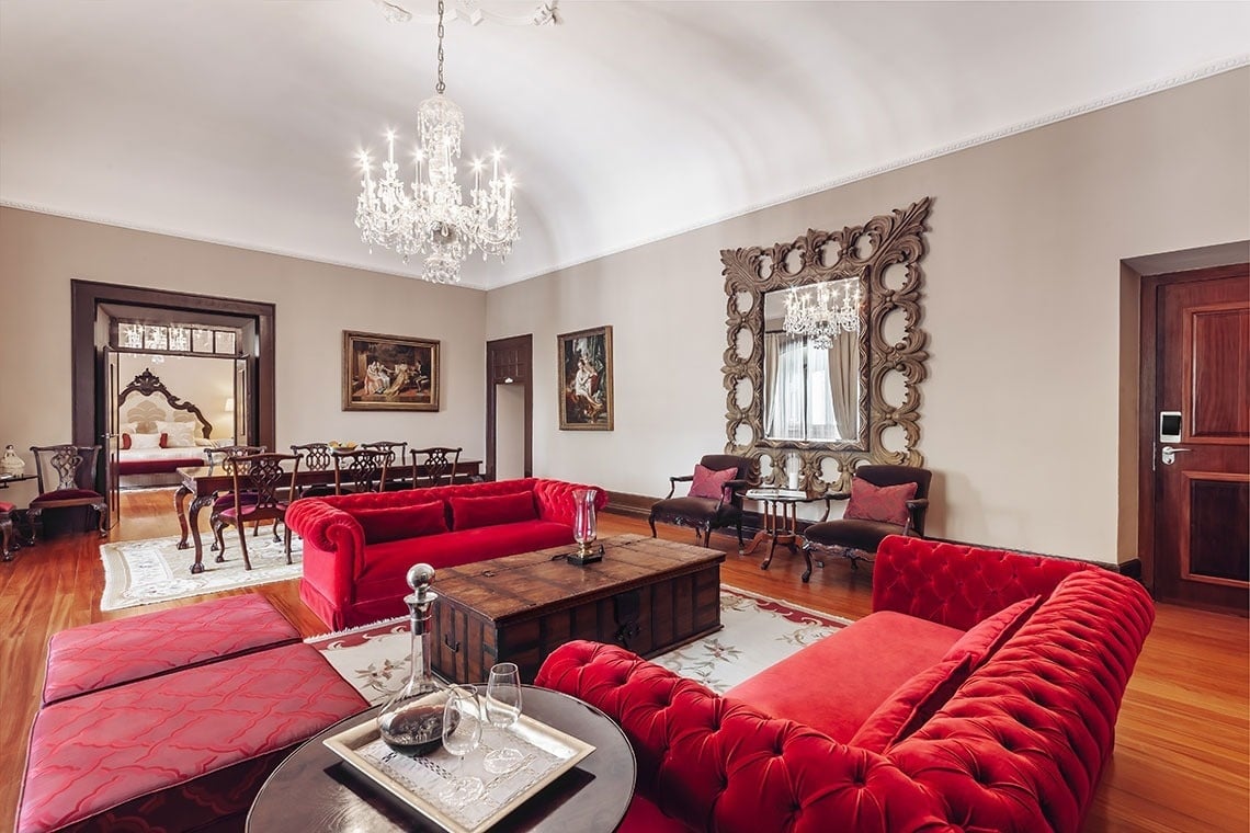 a hotel room with two beds and a bathroom