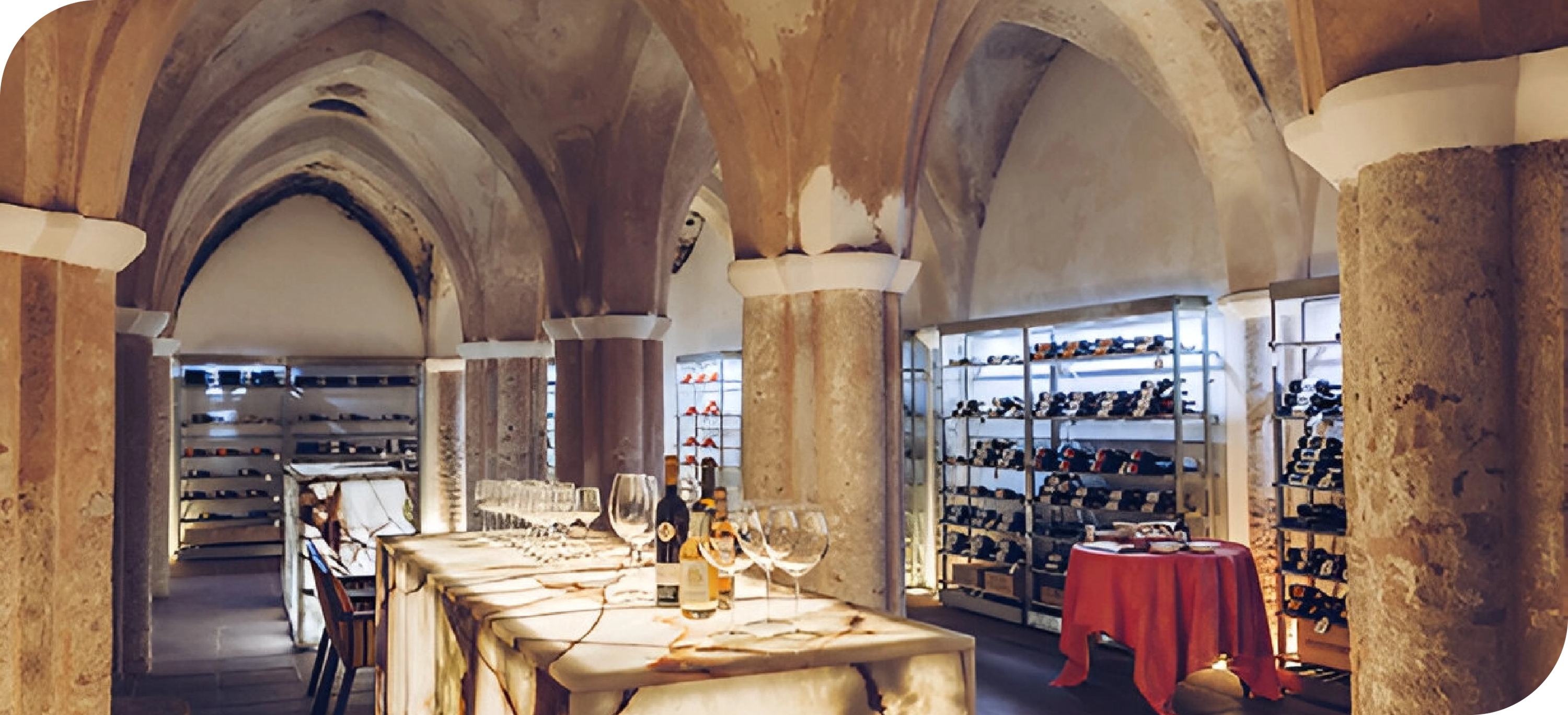 a bottle of wine sits on a table in a wine cellar