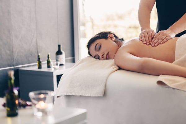 a bottle of conve espin wine is poured into a glass