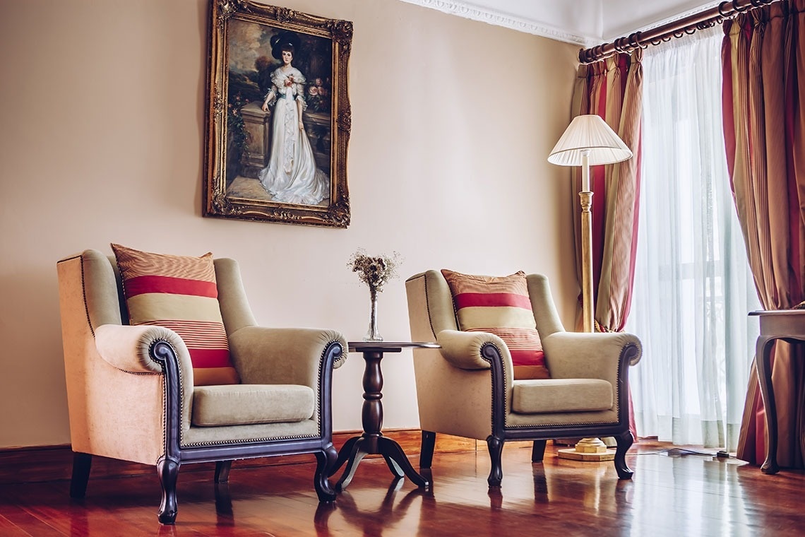 a hotel room with two beds and a large mirror