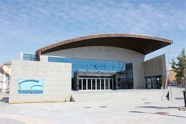 a large building with a sign that says centro cultural medina elvira