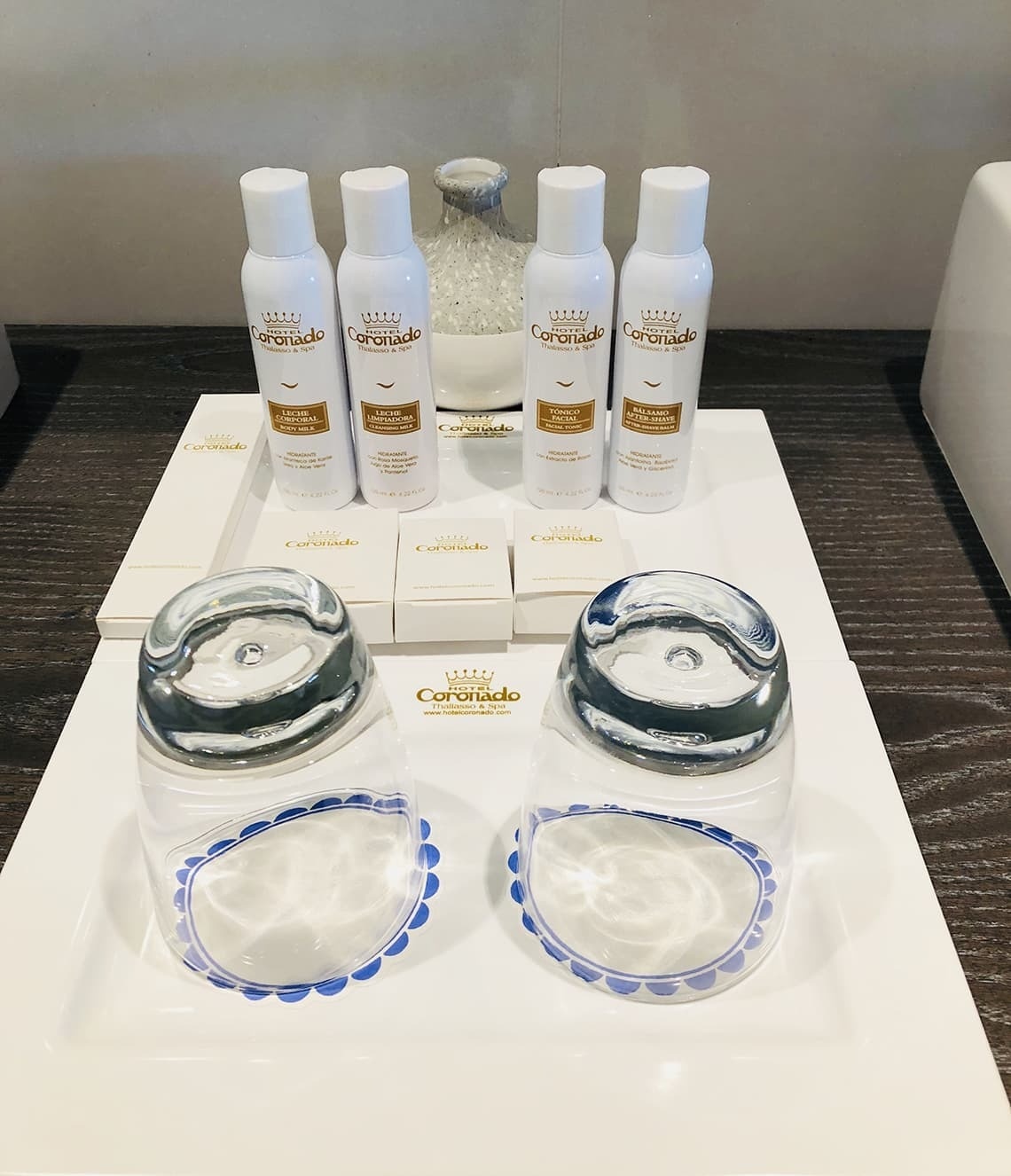 several bottles of coronado are on a white tray