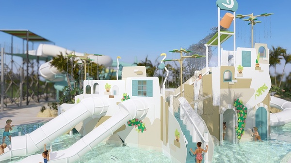 niños jugando en un tobogán en un parque acuático