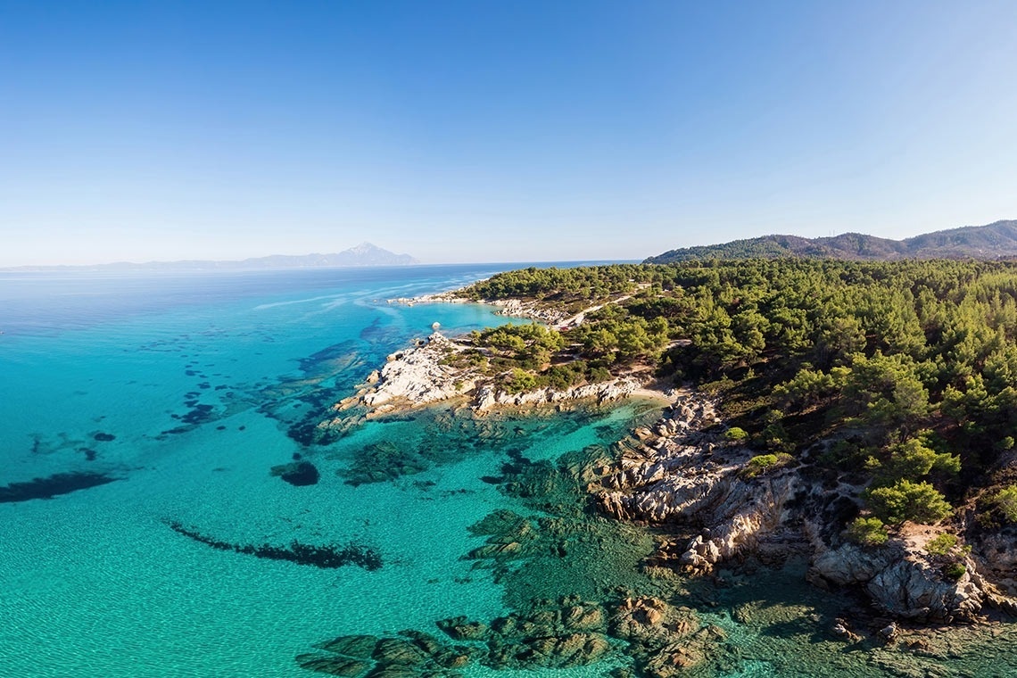 an aerial view of a small island in the middle of the ocean