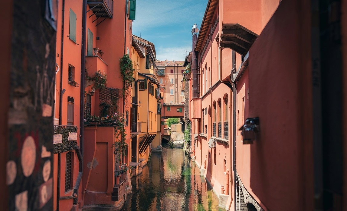 a wooden staircase leading up to a beach