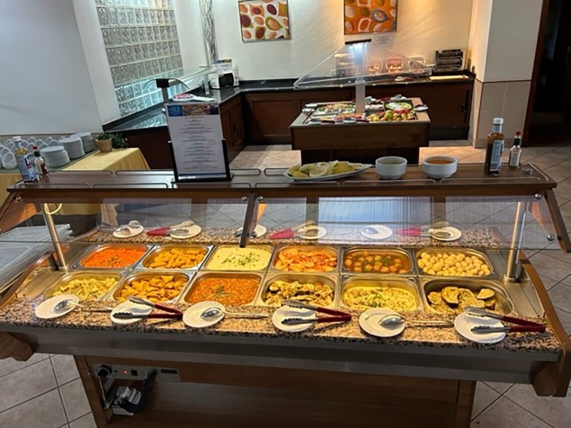 a buffet with a sign that says ' buffet ' on it