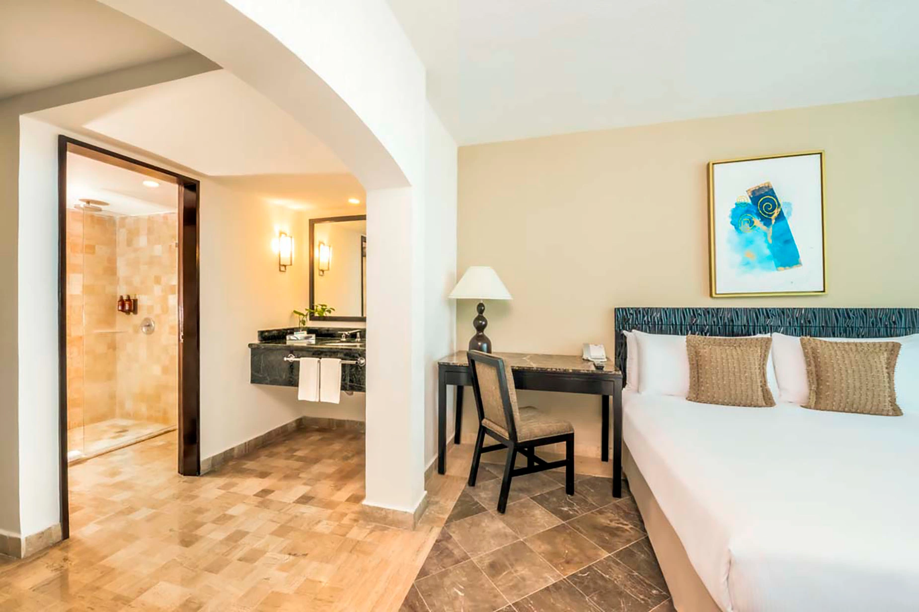 Modern hotel room with a DEMO 3, ensuite bathroom, and spacious bed.