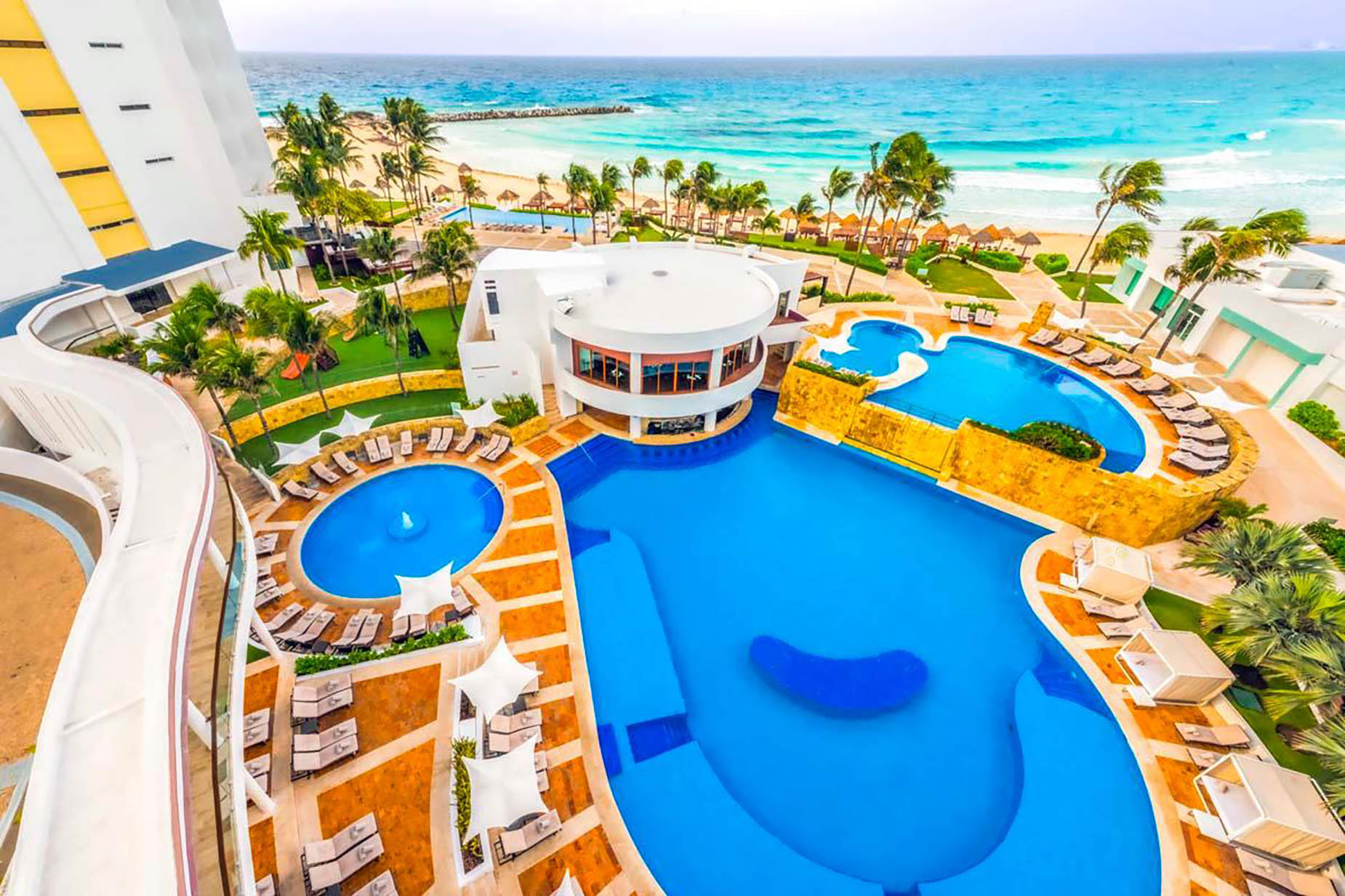Luxury resort pool with ocean view. Enjoy relaxation and fun at our DEMO 3.