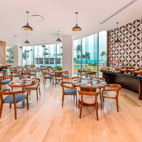 Elegant restaurant dining room with ocean views, ideal for DEMO 3.