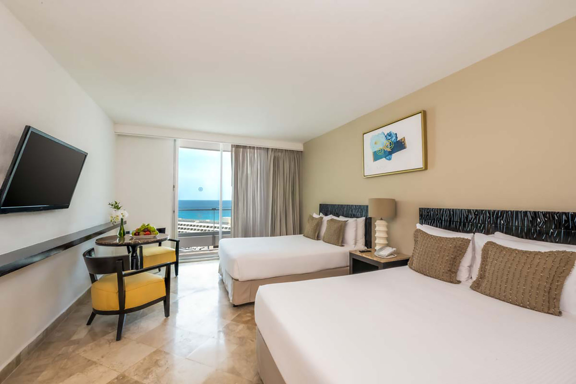 Hotel room with two beds, ocean view balcony, and modern decor. DEMO 3