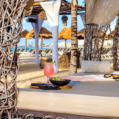 Tropical beach cabana with lounge bed, drink and sunglasses. Perfect for DEMO 3.
