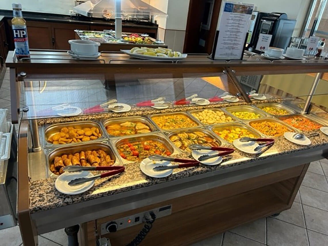 a buffet with a sign that says hp on it