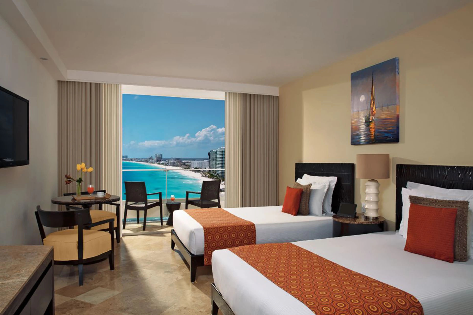 Hotel room with two beds, ocean view balcony, and beach vista. DEMO 3