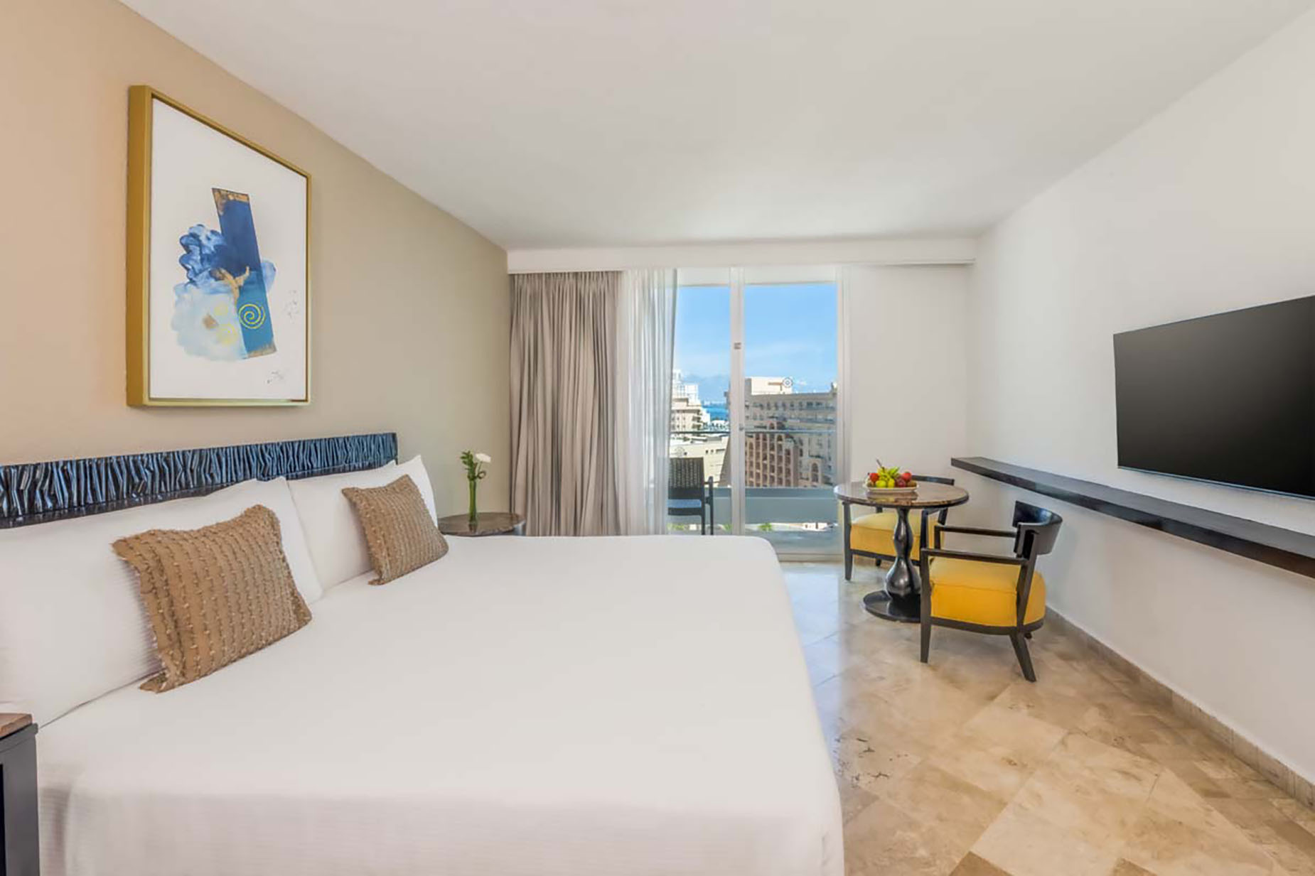 Modern hotel room with a king bed, city view balcony, and DEMO 3 for a comfortable stay.