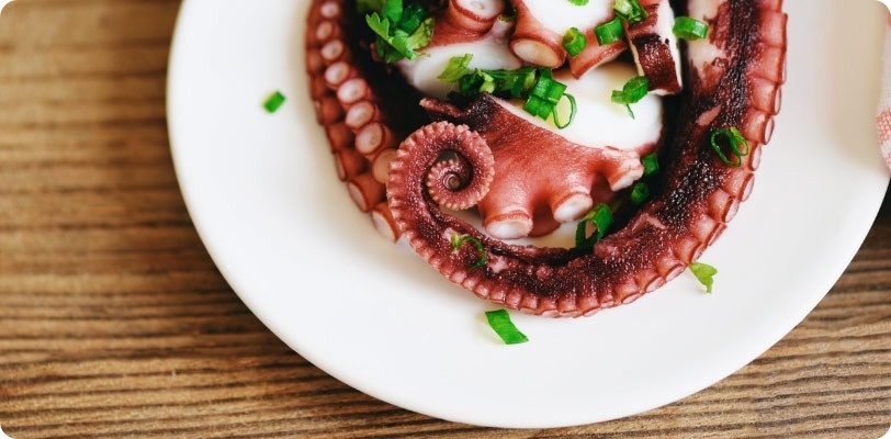 a buffet area with a variety of food and drinks