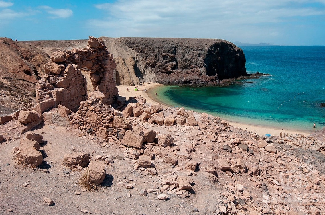 a buffet area with a variety of food and drinks