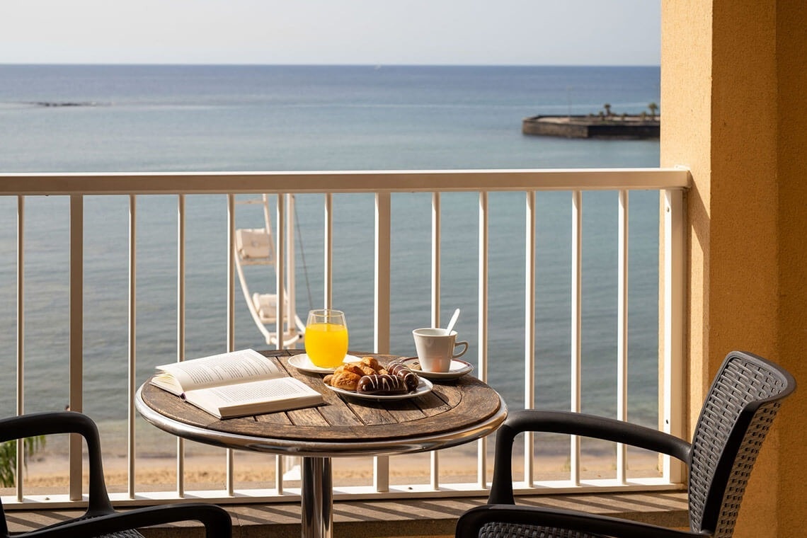 a buffet area with a variety of food and drinks