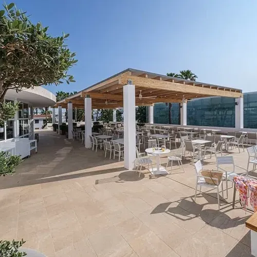 ESTIVAL corporate event outdoor terrace with tables and chairs.