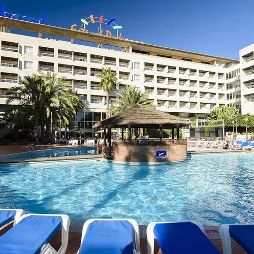 ESTIVAL: Corporativa pool & bar, hotel with palm trees and sun.