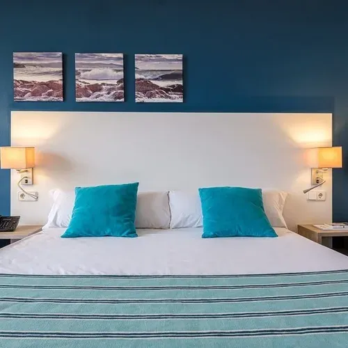 Modern bedroom with sea views, Estival Islantilla 4* hotel.