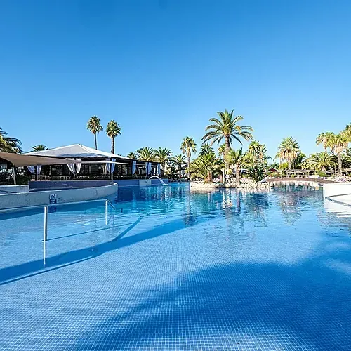 Poolside relaxation at Estival Islantilla 4*, Huelva. Official website.