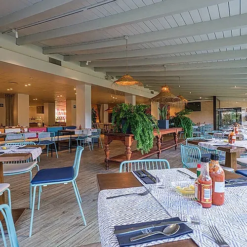 Bright restaurant at Estival Islantilla 4*, Huelva. Enjoy dining with a view.